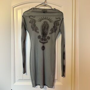 Elegant Sheer Black Dress with Intricate Designs